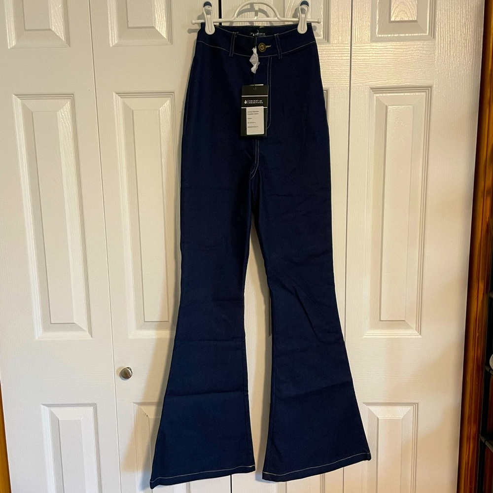 High-Waisted Flare Jeans With Rainbow Stitching Detail